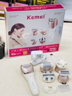 ست اصلاح 5 کاره کیمی مدل KM-8001 با بدنه‌ی سفید و رزگلد، و نمایشگر LED